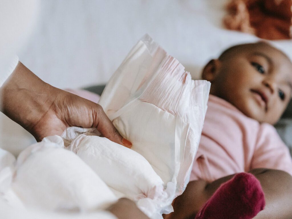 how to change a diaper on a plane